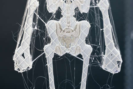 An example of bad 3D printing, a lot of plastic hair on an unconfigured 3D printerの写真素材