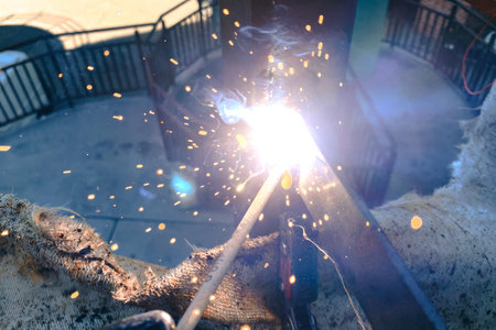 Welding of metal structures on a black background