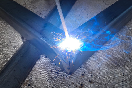 Bright arc welding, close-up of metal welding, many sparks
