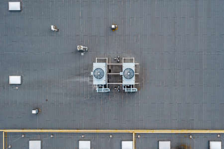 The roof of an industrial building, ventilation and air conditioning on the roof of an enterpriseの写真素材
