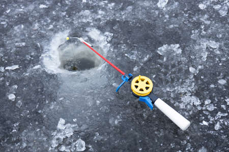 ice fishing, small ice fishing rod, winter hobbyの写真素材
