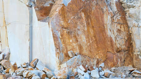Smooth sandy rocks of orange color, sand quarryの写真素材