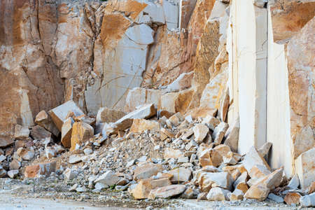 View of a crumbling rock, stones fall from a cliff, sandy cliffsの写真素材