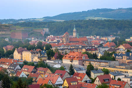Ancient Polish city of Klodzko from above. View of the red tiled roofs from aboveの写真素材