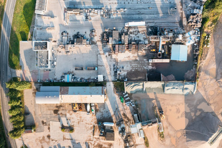 Aerial view of a large plant for the production of asphalt, cement and concrete. concrete mixing...