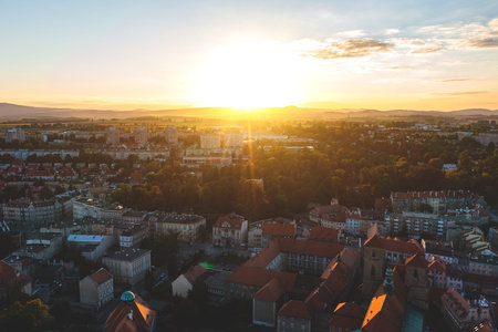 Aerial view of the city panorama at sunset, an ancient European city from a height, Poland, Klodzko