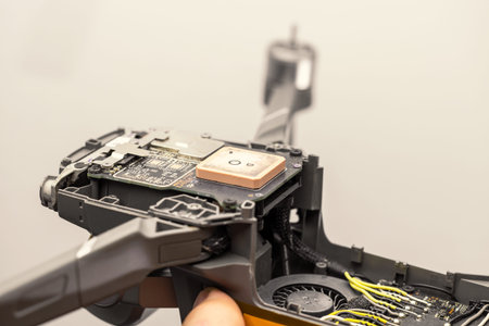 Disassembled quadcopter, quadcopter repair after a fall, service center