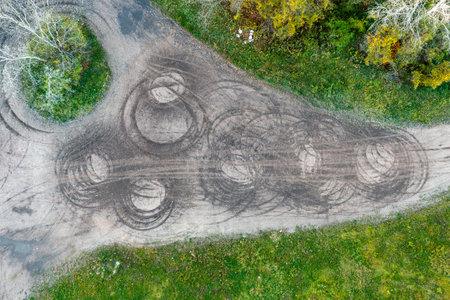 Drift tracks on a dirt road, Tire tracksの写真素材