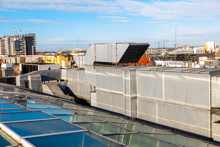Central air conditioning system on the roof of the building, large shafts for ventilation and cooling of the houseの写真素材