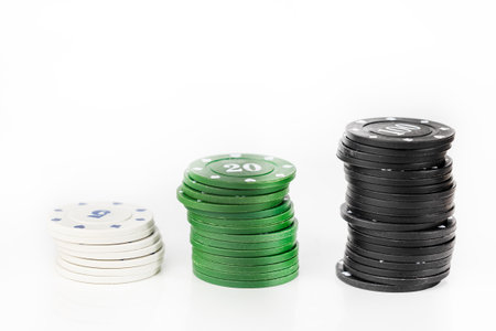 Poker chips stacked, poker game, chips on a white backgroundの写真素材
