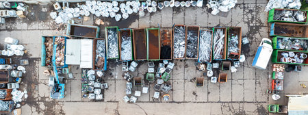 Containers from a height with different types of metal, Sorting for remelting metal productsの写真素材