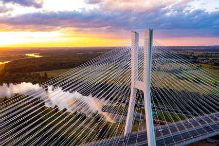 Bridge over the river at sunset. Top view of the white bridge over the Odra River. Wroclaw, Polandの写真素材