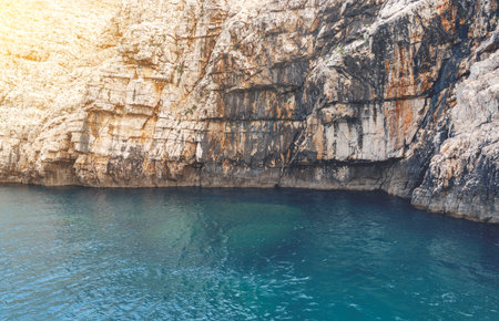 Waves breaking on coastal sea cliffs, seascape in hot summerの写真素材