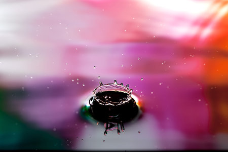 a splash in purple waterの写真素材