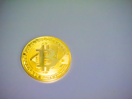 one of bitcoin on grey  background