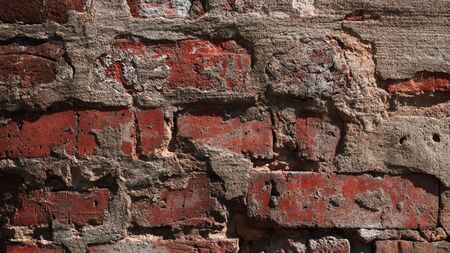 Old red brick wall backgroundの写真素材