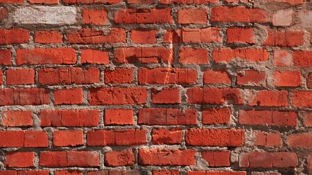 Old red brick wall backgroundの写真素材