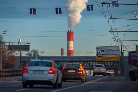 Cars on the highway and smoking pipe in Moscowの写真素材