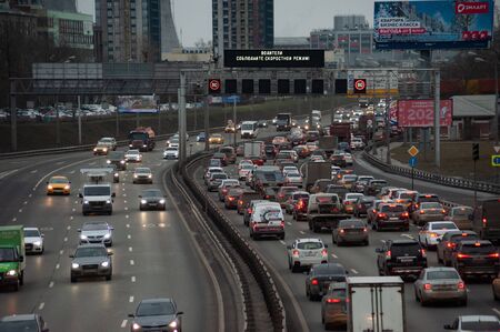 Cars on road in traffic jam in Moscowの写真素材