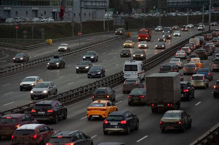 Cars on road in traffic jam in Moscowの写真素材