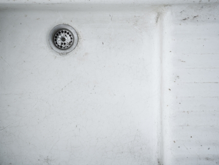 ceramic sanitary siphon dirt old earthenware white metal strainer rinse sinkの写真素材
