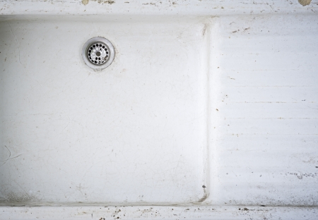 ceramic earthenware sanitary siphon dirt old white metal sieveの写真素材