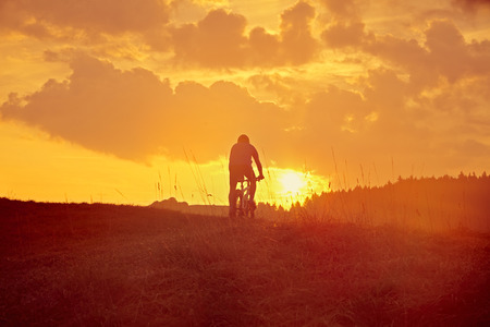 Downhill from the mountain in the sunriseの写真素材