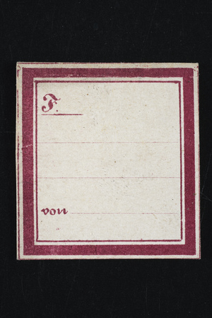 Exercise book old black and with label yellowed and frame redの写真素材