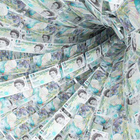 Money swirls of 5 pounds of moneyの写真素材