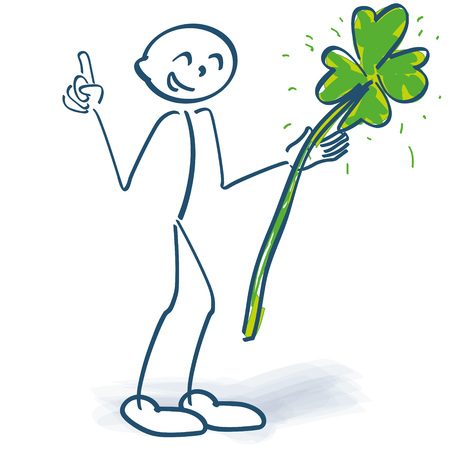 Stick figure with green shamrock and finger pointerのイラスト素材