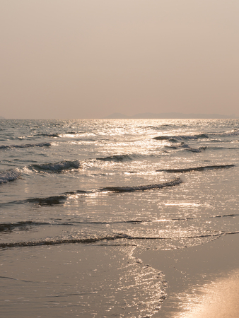 Wave at the beach sunset time in Rayong, Thailandの写真素材