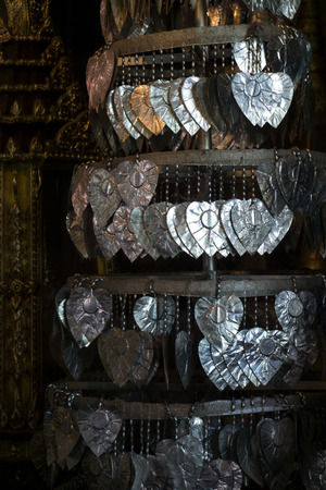 Silver Bodhi leaf for Buddha pray in Thailand ancient templeの写真素材