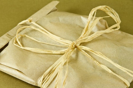  	Gift box on a golden backgroundの写真素材