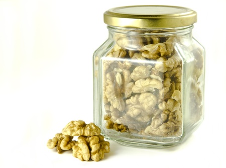 	Walnuts in a glass jarの写真素材