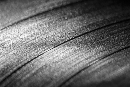 Black vinyl record grooves macroの写真素材