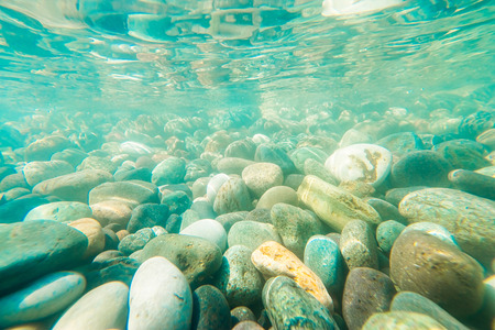 Underwater light on a rocky seafloor in the Black  sea. Selective focus.の写真素材
