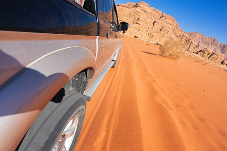 Safari in desert Wadi Rum. Motion blur, selective focus.