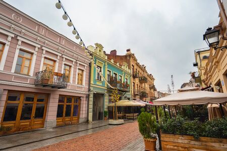 Street with outdoor cafe tents in old town Tbilisi. Georgia.の写真素材