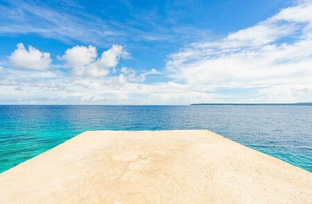 White springboard on blue sea and sky background. Wallpaper.の写真素材