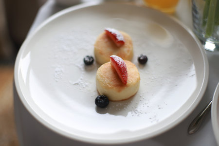 Cottage cheese casserole with berries for breakfast. Proper nutrition. summer diet. Breakfast in the roomの写真素材