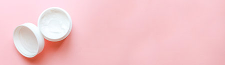 Banner Top view laying out hand cream on pink backgroundの写真素材