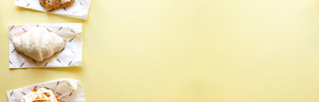 Banner Croissants on a yellow backgroundの写真素材