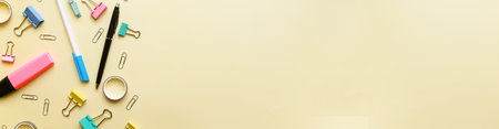 Banner Flat lay office supplies on yellow backgroundの写真素材