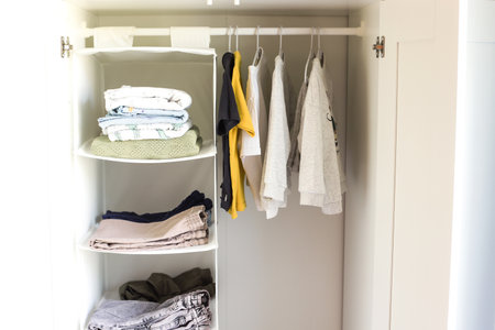 Children is wardrobe. Children is clothes on a hanger. Children Protection Dayの写真素材