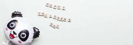 banner children's day. Children's Day lined with wooden letters. balloon panda