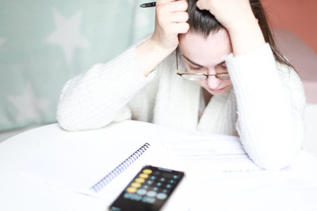 Counting invoices. Debts. A woman counts debts. big billsの写真素材