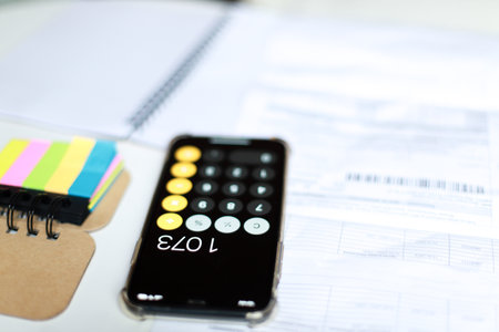 phone calculator. cost calculation. Knock out the budgetの写真素材
