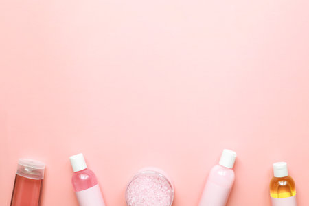 Flat lay spa jars. Mockup jars. flatlay beauty on pink backgroundの写真素材