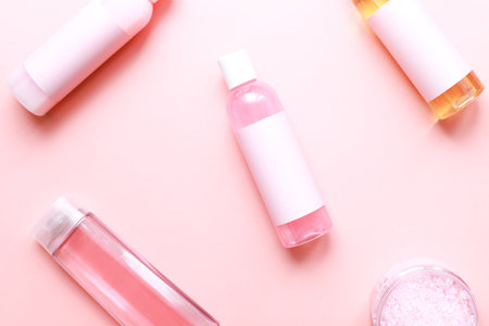 Flat lay spa on a pink background. Cosmetics mockup on pink backgroundの写真素材