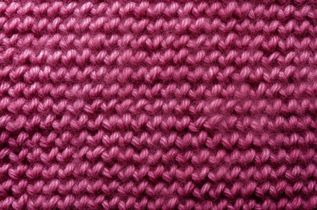 Texture of a pink knitted scarf in a heartの素材